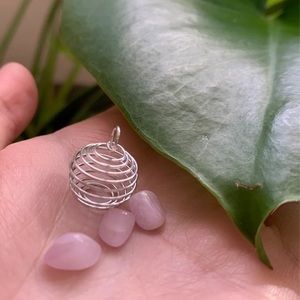Kunzite and cage pendant
